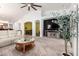 Open-concept living space with elegant lighting and a modern aesthetic at 7413 W Southgate Ave, Phoenix, AZ 85043
