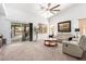 Spacious living area with sliding glass doors and ample natural light at 7413 W Southgate Ave, Phoenix, AZ 85043