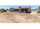 Spacious backyard with brick patio, outdoor seating, and desert landscaping at 7730 E Culver St, Mesa, AZ 85207