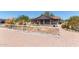 Backyard featuring a garden, desert landscaping, and partial fencing at 7730 E Culver St, Mesa, AZ 85207
