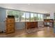 Bright bonus room with plenty of natural light and wood-look flooring at 7730 E Culver St, Mesa, AZ 85207