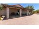 Covered patio with brick support posts, bench, outdoor furniture, and a backyard view at 7730 E Culver St, Mesa, AZ 85207