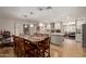 Bright dining room adjacent to the kitchen, perfect for entertaining guests at 7730 E Culver St, Mesa, AZ 85207