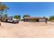Charming single-story home featuring a tile roof, two car garage and xeriscape front yard at 7730 E Culver St, Mesa, AZ 85207