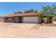 Single story home featuring a tile roof, a two car garage, and xeriscape landscaping at 7730 E Culver St, Mesa, AZ 85207
