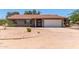 Charming single story home features a tile roof, two car garage, and brick accents at 7730 E Culver St, Mesa, AZ 85207