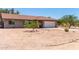Quaint single story home with tile roof, front-facing 2-car garage, and low maintenance landscaping at 7730 E Culver St, Mesa, AZ 85207