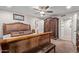 Spacious main bedroom boasts a large decorative armoire and furniture, enhancing the room's elegance at 7730 E Culver St, Mesa, AZ 85207