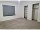 Bedroom features sliding door closet at 7801 N 44Th Dr # 1036, Glendale, AZ 85301