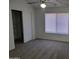 Carpeted bedroom features ceiling fan and a window at 7801 N 44Th Dr # 1036, Glendale, AZ 85301