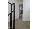 Upstairs hallway with neutral carpet and white walls leading to the bedrooms at 7801 N 44Th Dr # 1036, Glendale, AZ 85301