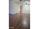 Bright and airy living room with staircase, ceiling fan, and wood-look flooring at 7801 N 44Th Dr # 1036, Glendale, AZ 85301