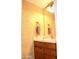 Updated bathroom with vanity and decorative wall finish at 7977 W Wacker Rd # 196, Peoria, AZ 85381