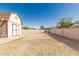 Large backyard with a shed and surrounded by a privacy wall at 840 N Acacia --, Mesa, AZ 85213