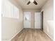 Bedroom space with vinyl floors, a window, and two doorways at 840 N Acacia --, Mesa, AZ 85213