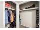 Walk-in closet with shelving and hanging storage for clothes and shoes at 840 N Acacia --, Mesa, AZ 85213