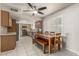 Bright kitchen with updated stainless appliances, tile floors, and a spacious breakfast nook with lots of natural light at 840 N Acacia --, Mesa, AZ 85213