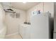 Laundry room with a washer, dryer and storage space at 840 N Acacia --, Mesa, AZ 85213
