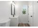 Bathroom featuring modern vanity, updated fixtures, and tile flooring at 845 E Hampton Ave, Mesa, AZ 85204
