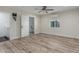 Cozy bedroom with wood floors and adjacent bathroom at 845 E Hampton Ave, Mesa, AZ 85204