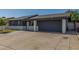 Charming single story home featuring a spacious driveway and a covered parking space at 845 E Hampton Ave, Mesa, AZ 85204