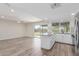 Open kitchen with granite counters, stainless appliances, and breakfast bar at 845 E Hampton Ave, Mesa, AZ 85204