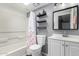 Simple bathroom featuring a shower-tub combo, modern vanity, and mirrored medicine cabinet at 8940 W Olive Ave # 59, Peoria, AZ 85345
