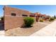 Attractive desert home boasts a stucco exterior, low-maintenance landscaping, and secure gated entrances for privacy at 8940 W Olive Ave # 59, Peoria, AZ 85345