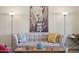 Close up on living room furniture and decorative wall art at 10431 W Roundelay Cir, Sun City, AZ 85351