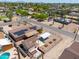 This property has a large lot with solar panels, covered parking, storage, a fenced yard, and raised garden beds at 1109 N Walnut Dr, Casa Grande, AZ 85122