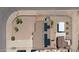 Aerial view of house roof with solar panels, storage, fenced yard and covered parking at 1109 N Walnut Dr, Casa Grande, AZ 85122