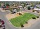 Community aerial view of playground with green grass at 1109 N Walnut Dr, Casa Grande, AZ 85122