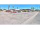 Spacious backyard with fence, gravel, and covered parking at 1109 N Walnut Dr, Casa Grande, AZ 85122