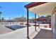 Large carport with attached storage offers ample parking space and convenient access to the main house at 1109 N Walnut Dr, Casa Grande, AZ 85122