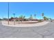 Corner lot single-story brick home with mature trees and desert landscaping at 1109 N Walnut Dr, Casa Grande, AZ 85122