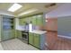 Well-equipped kitchen with modern appliances, ample counter space, and bright recessed lighting at 1109 N Walnut Dr, Casa Grande, AZ 85122