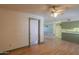 Open concept living space with wood floors seamlessly connects to the adjoining kitchen at 1109 N Walnut Dr, Casa Grande, AZ 85122