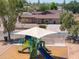 Colorful playground with slides, climbing structures and sun protection for outdoor Gathering fun at 1109 N Walnut Dr, Casa Grande, AZ 85122