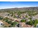 Scenic aerial view of the neighborhood with mountain views in the background at 1506 E Branham Ln, Phoenix, AZ 85042