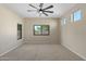 Bright bedroom with multiple windows offering natural light and serene views at 1506 E Branham Ln, Phoenix, AZ 85042