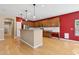 Well-equipped kitchen features granite countertops, ample cabinetry, and a functional center island at 1506 E Branham Ln, Phoenix, AZ 85042