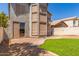 The home has a well-maintained backyard with a brick patio, providing an ideal outdoor retreat at 1515 E South Fork Dr, Phoenix, AZ 85048