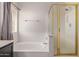 Bright bathroom with a soaking tub and glass-enclosed shower, offering a spa-like experience at 1515 E South Fork Dr, Phoenix, AZ 85048