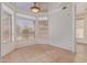 Bright living area with large windows and neutral tiled flooring; an open layout creates a comfortable living space at 1515 E South Fork Dr, Phoenix, AZ 85048