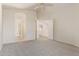 Main bedroom with an en suite bathroom and large closet featuring neutral walls and carpet at 1515 E South Fork Dr, Phoenix, AZ 85048