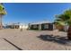 Street view of a charming single story home with low maintenance desert landscaping at 1527 W Roma Ave, Phoenix, AZ 85015