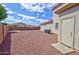 Spacious backyard with low-maintenance landscaping and secure fencing, perfect for outdoor activities at 1789 E Desert Breeze Pl, Casa Grande, AZ 85122
