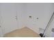 Clean laundry room offering ample space and essential hookups at 1789 E Desert Breeze Pl, Casa Grande, AZ 85122