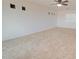 Spacious living room featuring neutral carpet and a ceiling fan at 1789 E Desert Breeze Pl, Casa Grande, AZ 85122