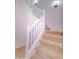 Carpeted staircase featuring white railing at 1789 E Desert Breeze Pl, Casa Grande, AZ 85122